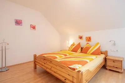 Ein Bett oder Betten in einem Zimmer der Unterkunft Appartementhaus Freiler