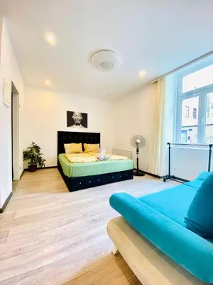 Ein Bett oder Betten in einem Zimmer der Unterkunft Modern 1BR Stay Comfort for 3 in Central Vienna