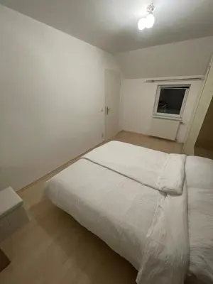 Ein Bett oder Betten in einem Zimmer der Unterkunft Moderne Wohnung mit Garten