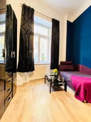 Ein Bett oder Betten in einem Zimmer der Unterkunft Elegant 1-Bedroom Apartment Near Danube River