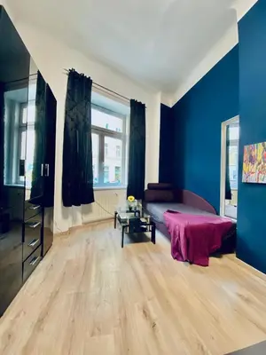 Ein Sitzbereich in der Unterkunft Elegant 1-Bedroom Apartment Near Danube River