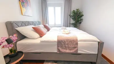 Ein Bett oder Betten in einem Zimmer der Unterkunft Serviced Apartment Neuwaldegg