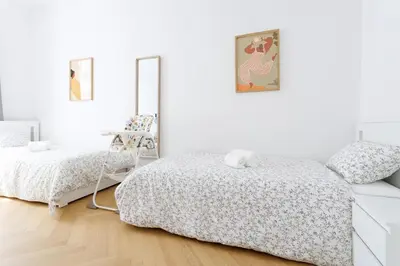 Ein Bett oder Betten in einem Zimmer der Unterkunft Central Stylish Apartment near Opera