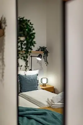 Ein Bett oder Betten in einem Zimmer der Unterkunft SUPERIOR DESIGN APARTMENT by JR City Apartments