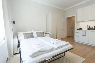Ein Bett oder Betten in einem Zimmer der Unterkunft josef's home I Comfort Studio 04