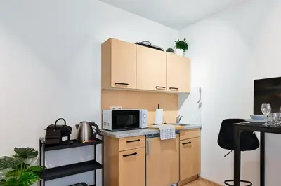 Küche/Küchenzeile in der Unterkunft Bright City Apartment Free Parking & 2 Min to Subway