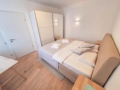 Ein Bett oder Betten in einem Zimmer der Unterkunft LuVi