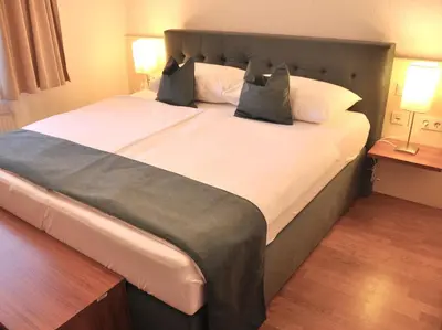 Ein Bett oder Betten in einem Zimmer der Unterkunft Home Sweet Apartments - A cozy welcome