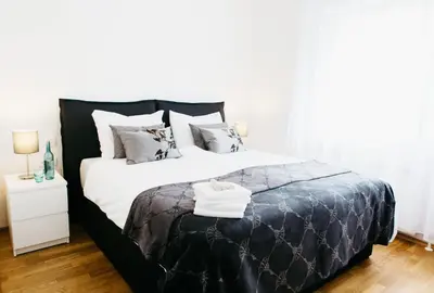 Ein Bett oder Betten in einem Zimmer der Unterkunft Home Sweet Apartments - A cozy welcome