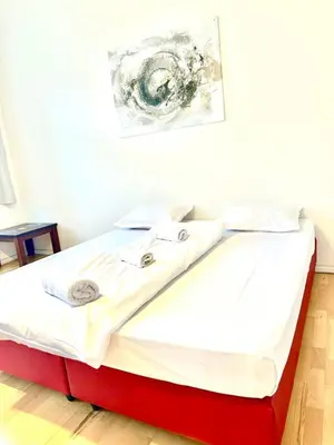 Ein Bett oder Betten in einem Zimmer der Unterkunft Laxenburger City Apartments - Only 8Min TO CITY CENTER VIENNA