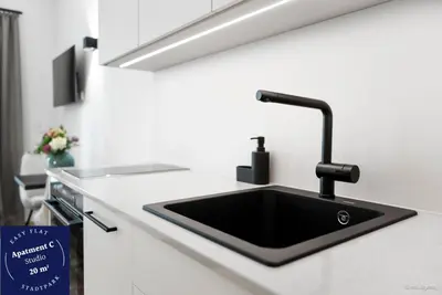 Küche/Küchenzeile in der Unterkunft easy-flat Stadtpark - Premium AC Apartments
