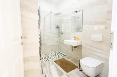 Ein Badezimmer in der Unterkunft Top Apart close to city center