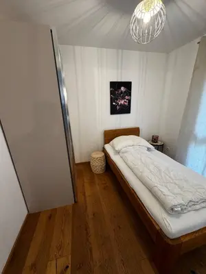 Ein Bett oder Betten in einem Zimmer der Unterkunft Cozy 2BR Apartment In Floridsdorf Area