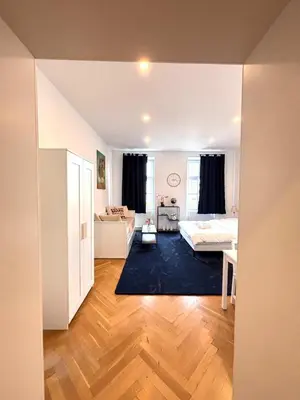 Ein Bett oder Betten in einem Zimmer der Unterkunft Royalty Zimmer