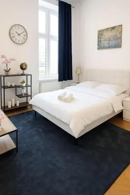 Ein Bett oder Betten in einem Zimmer der Unterkunft Royalty Zimmer
