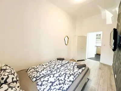 Ein Bett oder Betten in einem Zimmer der Unterkunft Cozy Rooms in Brigittenau Area MM7