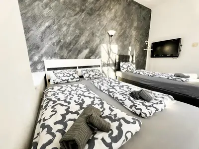Ein Bett oder Betten in einem Zimmer der Unterkunft Cozy Rooms in Brigittenau Area MM7