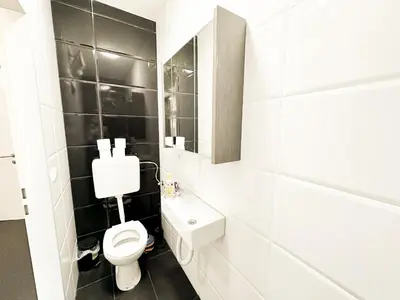 Ein Badezimmer in der Unterkunft Cozy Rooms in Brigittenau Area MM7