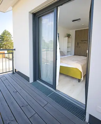 Ein Balkon oder eine Terrasse in der Unterkunft VARIO-HAUS Residence
