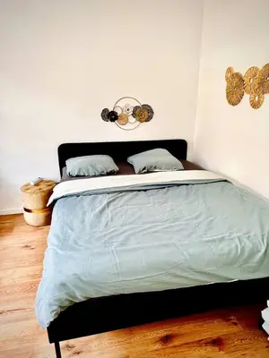 Ein Bett oder Betten in einem Zimmer der Unterkunft Cozy Apartment in Märzstraße Area MZ37