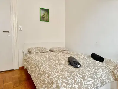 Ein Bett oder Betten in einem Zimmer der Unterkunft Stylish Flat in Heart of Vienna