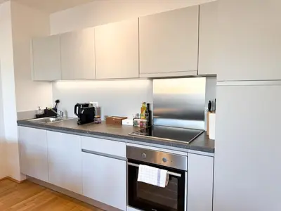 Küche/Küchenzeile in der Unterkunft Cozy & Modern 2 BR Apartment in peaceful Area