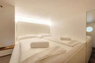 Ein Bett oder Betten in einem Zimmer der Unterkunft Grand Pods - Stylish Sleeping Concept