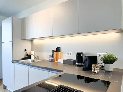 Küche/Küchenzeile in der Unterkunft Modern & Spacious 2BR Apartment with Balcony