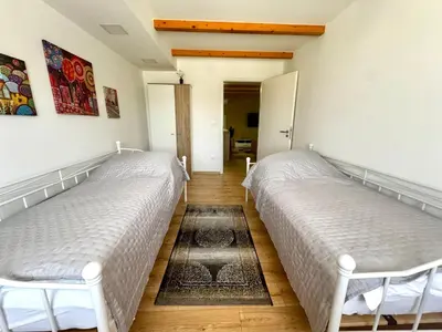 Ein Bett oder Betten in einem Zimmer der Unterkunft Stork Apartment