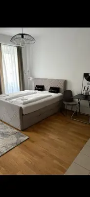 Ein Bett oder Betten in einem Zimmer der Unterkunft Vienna City Apartment Crown 11