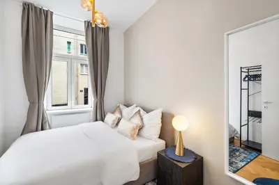Ein Bett oder Betten in einem Zimmer der Unterkunft dreamfactory Residence - Westside