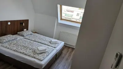 Ein Bett oder Betten in einem Zimmer der Unterkunft bookVienna Apartments