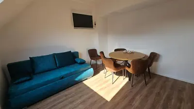 Ein Sitzbereich in der Unterkunft bookVienna Apartments