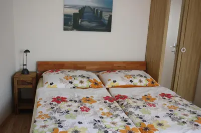 Ein Bett oder Betten in einem Zimmer der Unterkunft Ferienwohnung Heiling