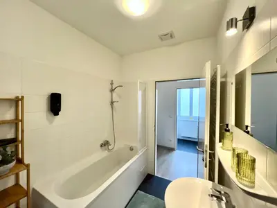Ein Badezimmer in der Unterkunft SERVUS HOMES - Metro Stadthalle - VIENNA CALLING
