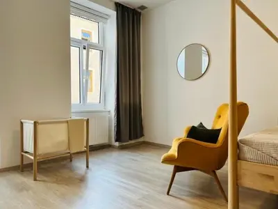 Ein Sitzbereich in der Unterkunft SERVUS HOMES - Metro Stadthalle - VIENNA CALLING