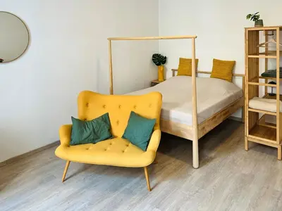 Ein Bett oder Betten in einem Zimmer der Unterkunft SERVUS HOMES - Metro Stadthalle - VIENNA CALLING