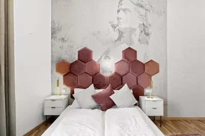 Ein Bett oder Betten in einem Zimmer der Unterkunft Elegant Room Near Prater & City Center