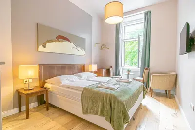 Ein Bett oder Betten in einem Zimmer der Unterkunft 1 Apt & 5 Aparthotels for Groups by Mariahilfer
