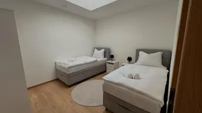 Ein Bett oder Betten in einem Zimmer der Unterkunft Apartment Andi Parndorf