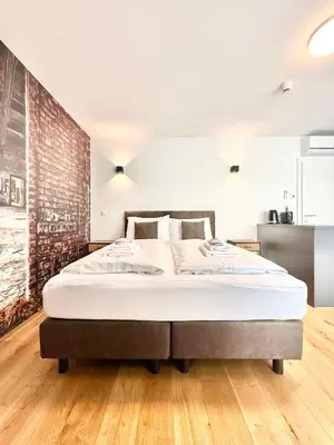 Ein Bett oder Betten in einem Zimmer der Unterkunft Möbliertes Apartment