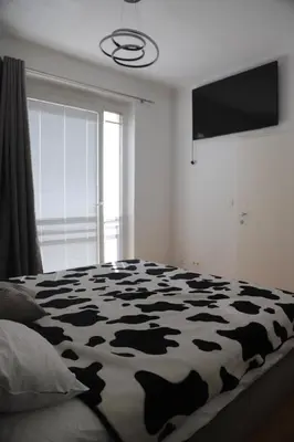 Ein Bett oder Betten in einem Zimmer der Unterkunft City Central Suite