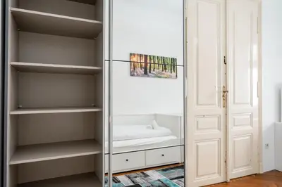 Ein Bett oder Betten in einem Zimmer der Unterkunft Heritage Apartments in Historical Musician Residence of Josef Klein