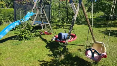 Ein Kinderspielbereich in der Unterkunft Ferienwohnung Heider