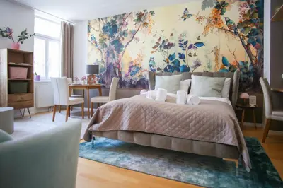 Ein Bett oder Betten in einem Zimmer der Unterkunft Cozy Stylish Apartment