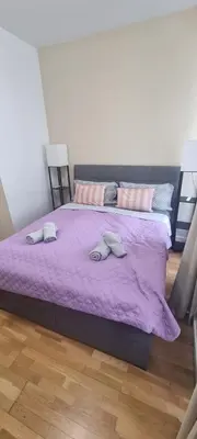Ein Bett oder Betten in einem Zimmer der Unterkunft Deluxe Living