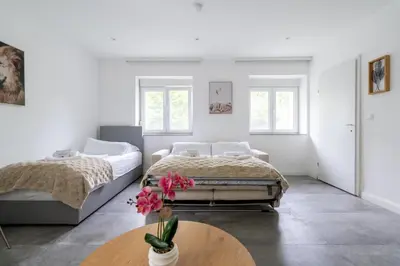 Ein Bett oder Betten in einem Zimmer der Unterkunft COY Apartments Purkersdorf - Garden Comfort for Work Family near Vienna
