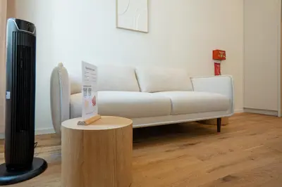 Ein Sitzbereich in der Unterkunft Elegant studio with king-size bed Self check-in