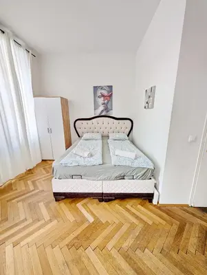 Ein Bett oder Betten in einem Zimmer der Unterkunft Charming Stay - Close to Vienna Attractions MZ17a