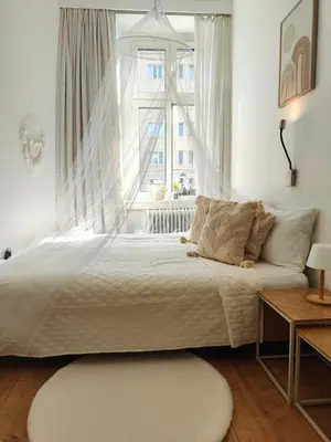 Ein Bett oder Betten in einem Zimmer der Unterkunft Cozy small apartment